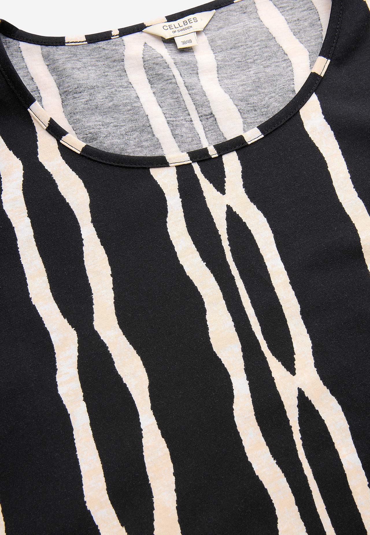 Vzorované žerzejové šaty s kapsami