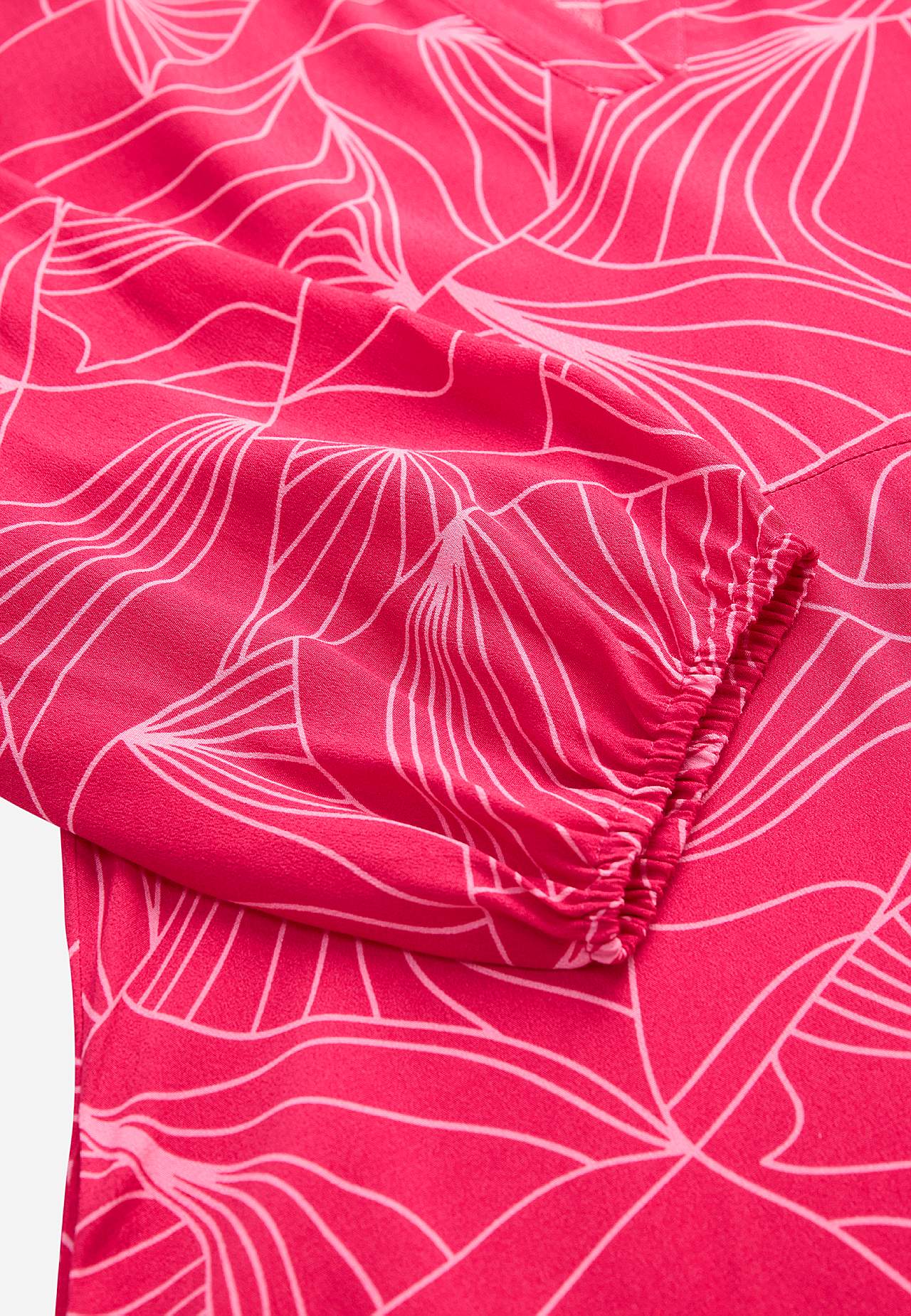 Tkané šaty s kapsami