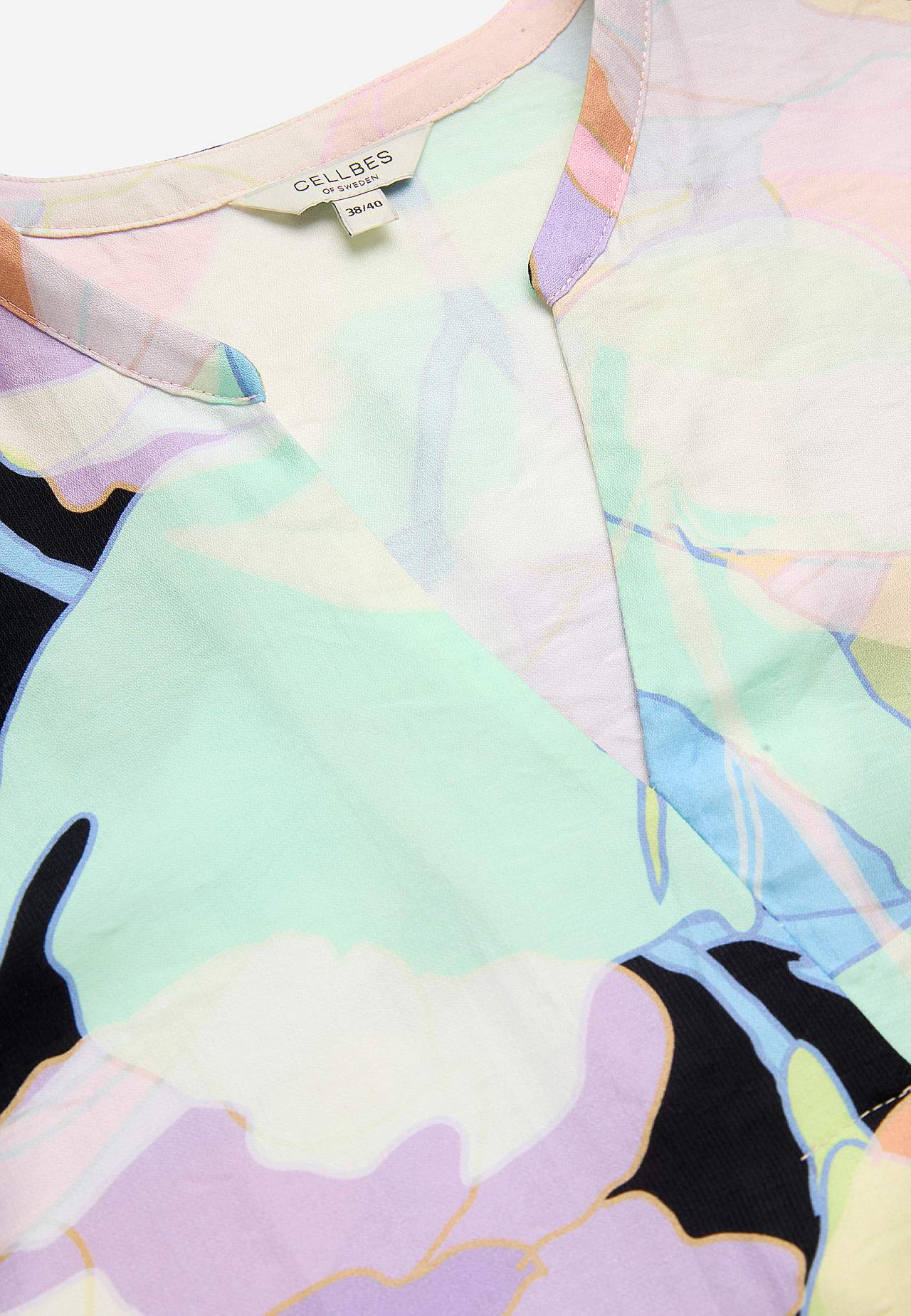 Tkaná a vzorovaná blůza