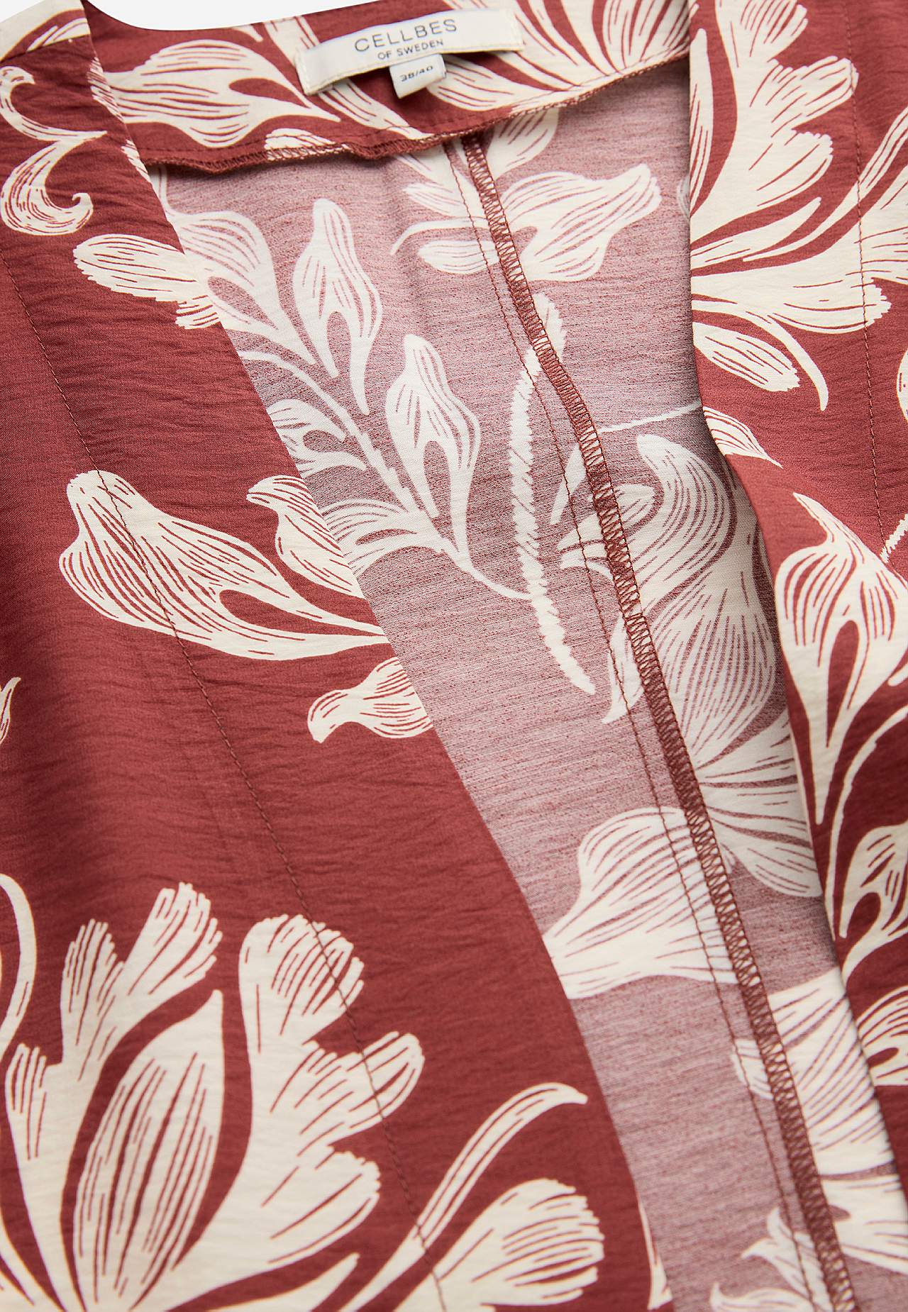 Otevřený kaftan s kapsami