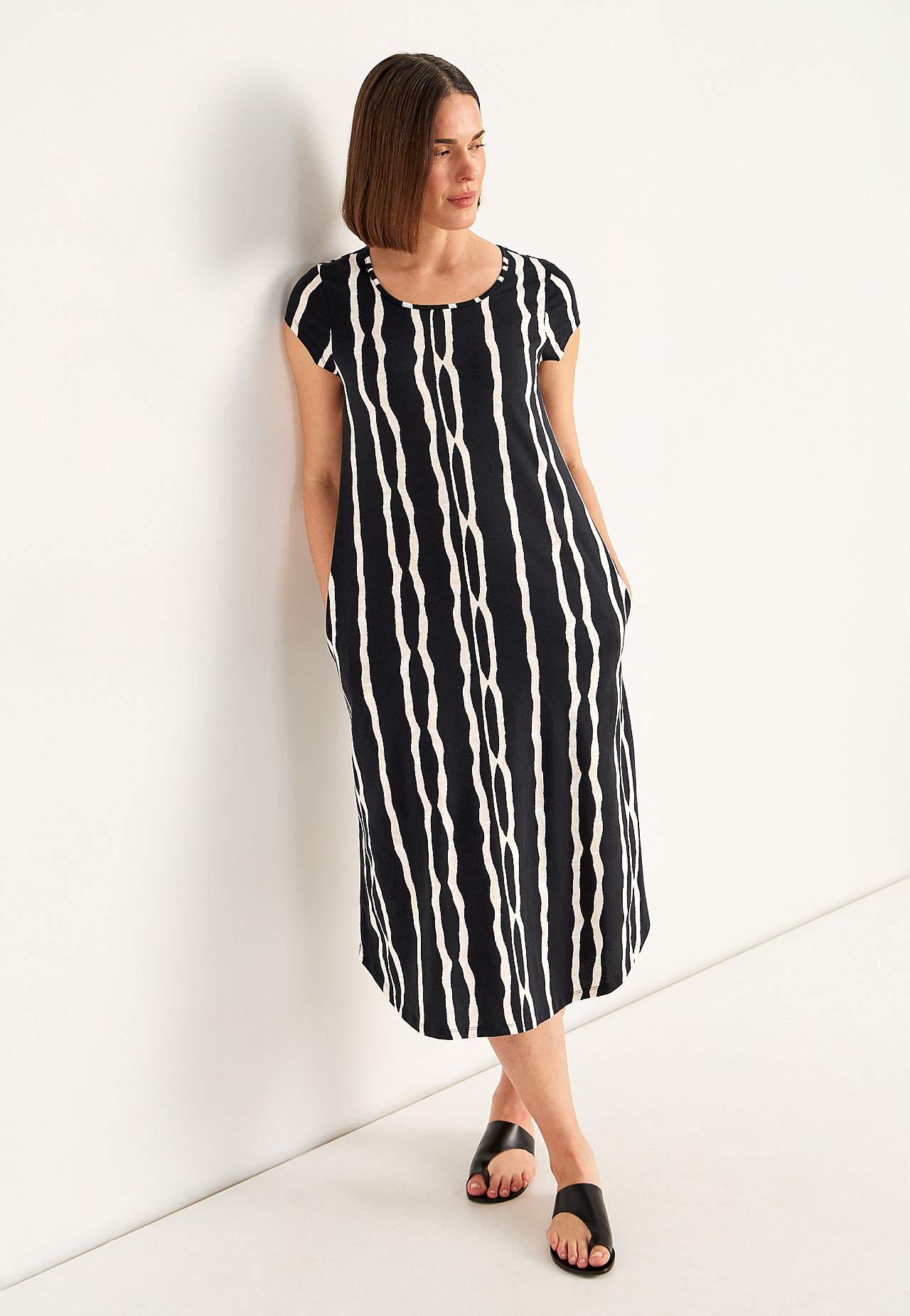 Vzorované žerzejové šaty s kapsami