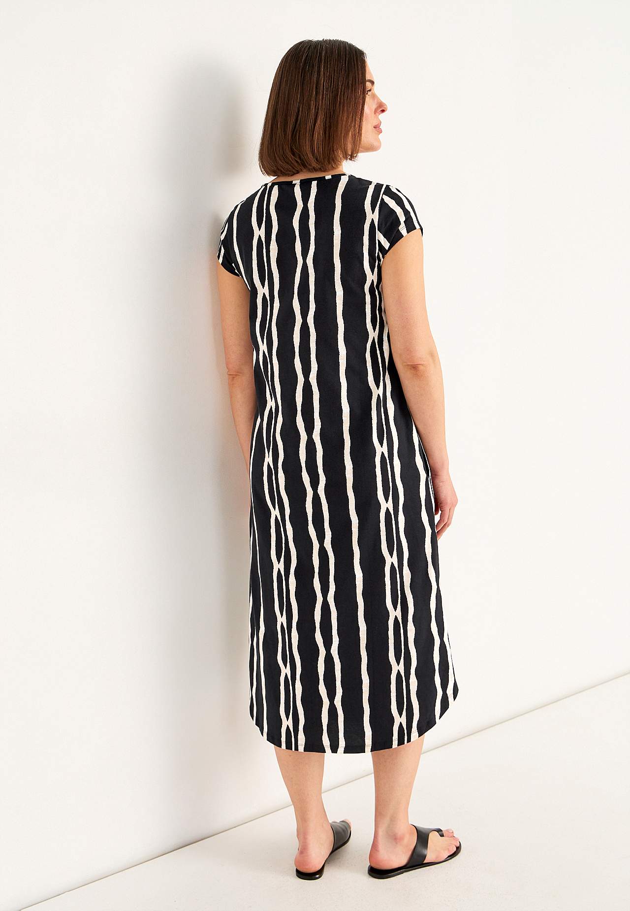 Vzorované žerzejové šaty s kapsami