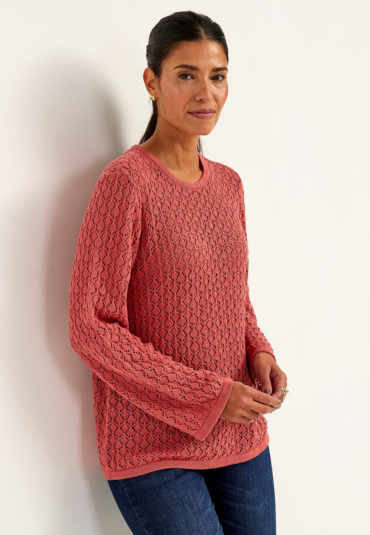 Pletený svetr s propracovaným vzorem