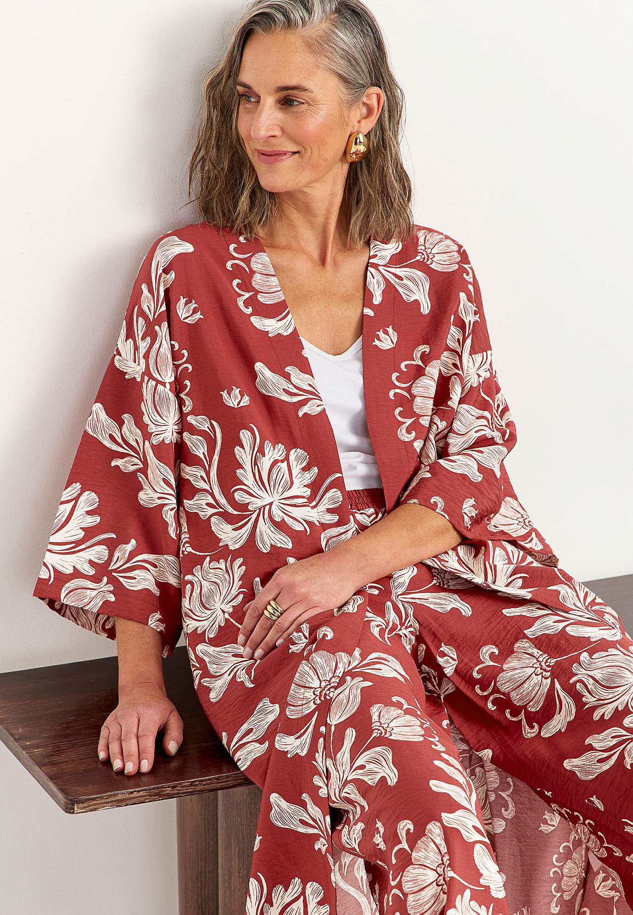 Otevřený kaftan s kapsami