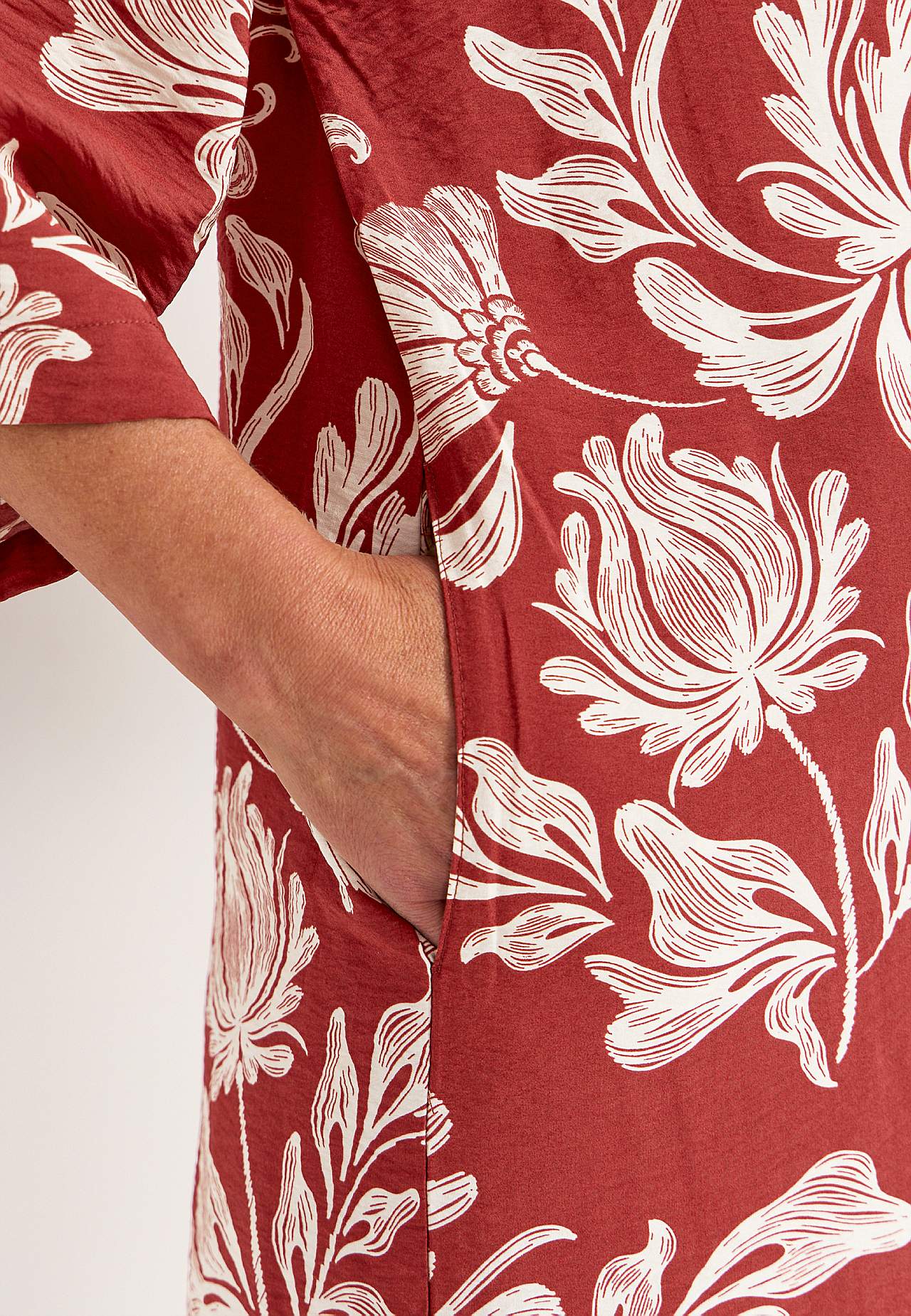 Otevřený kaftan s kapsami