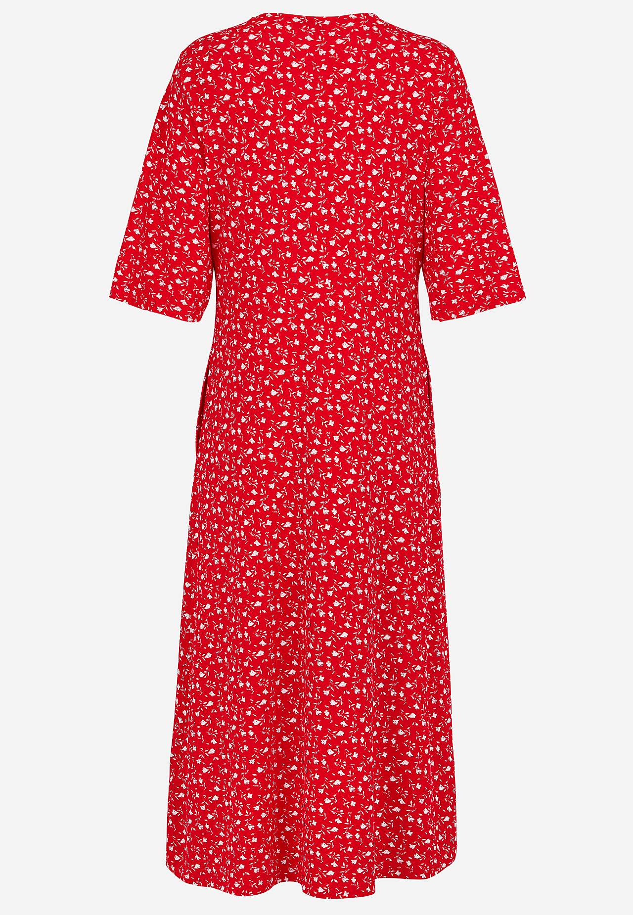 Žerzejové šaty s květinovým vzorem a kapsami